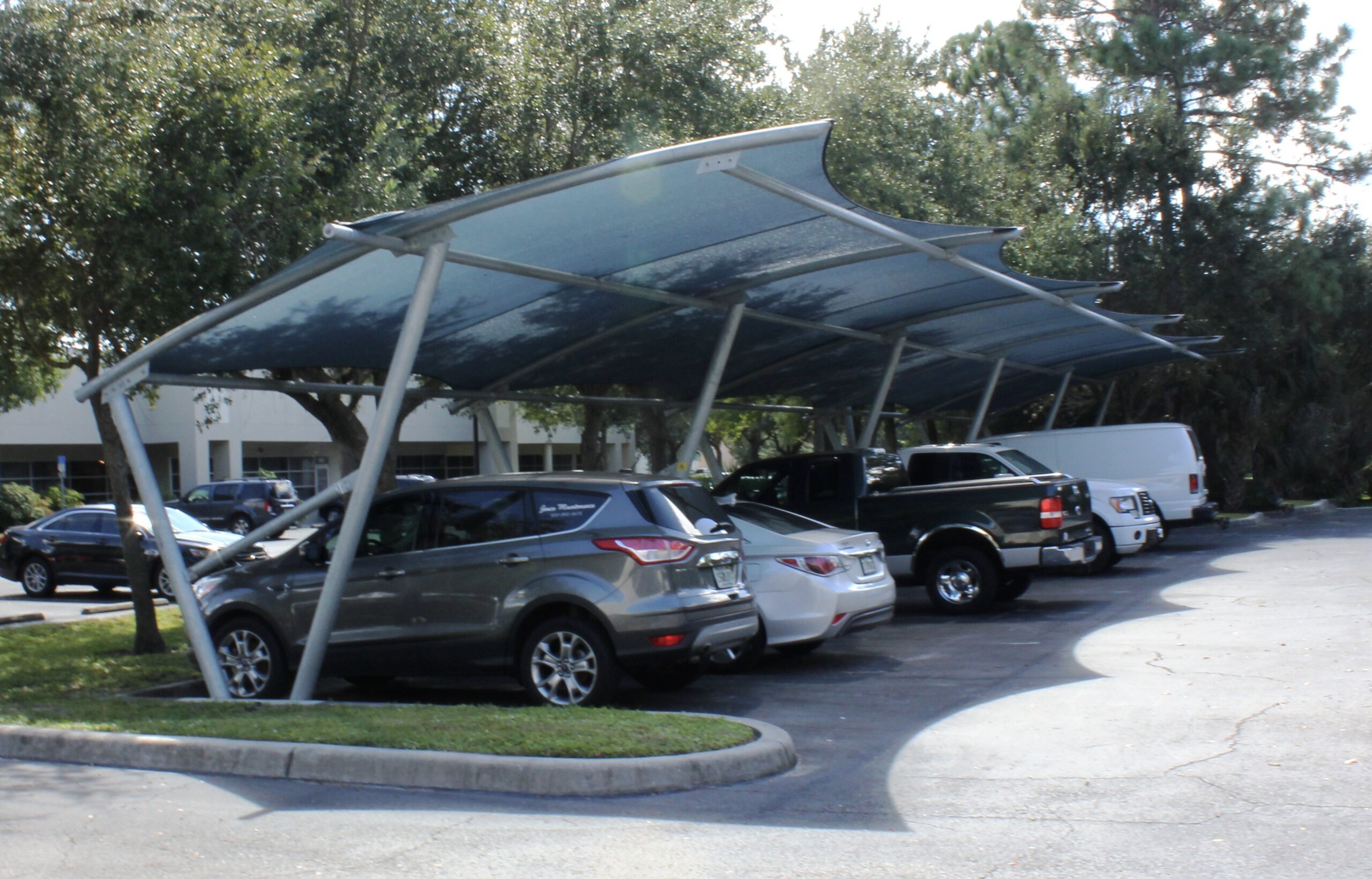 Cantor Modern Sun Shade over Parking Lot | Industrial Shadeports