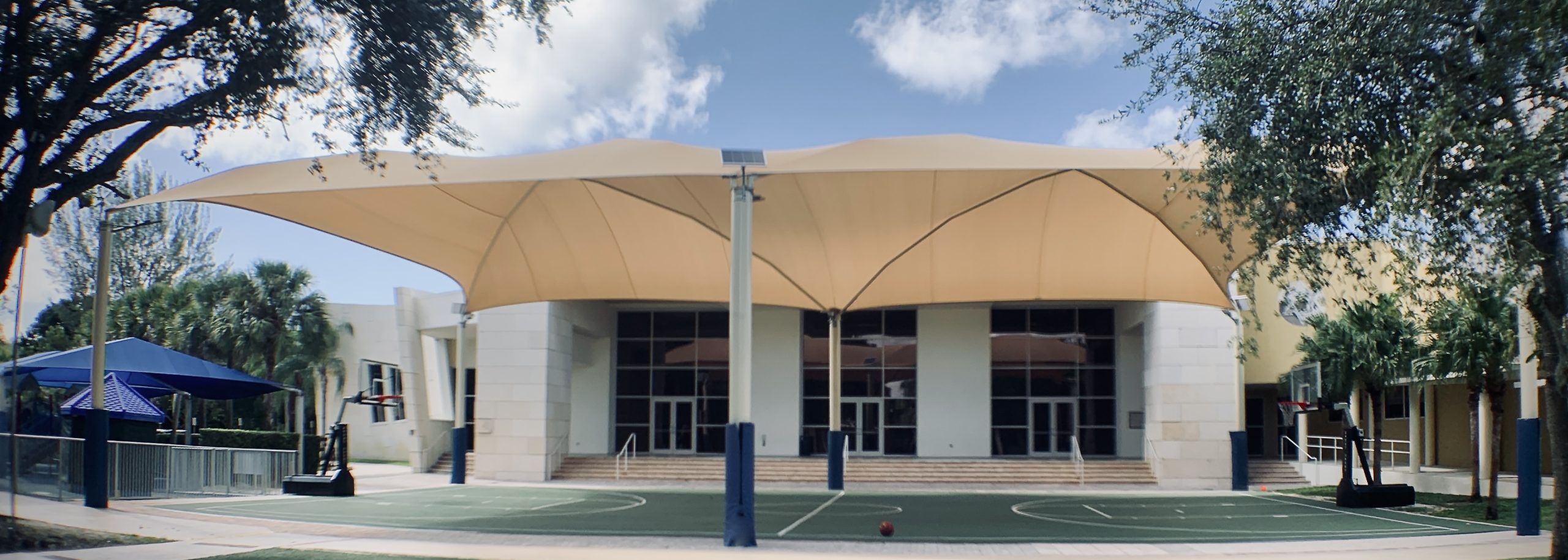 Shade Structure over an outdoor basketball court