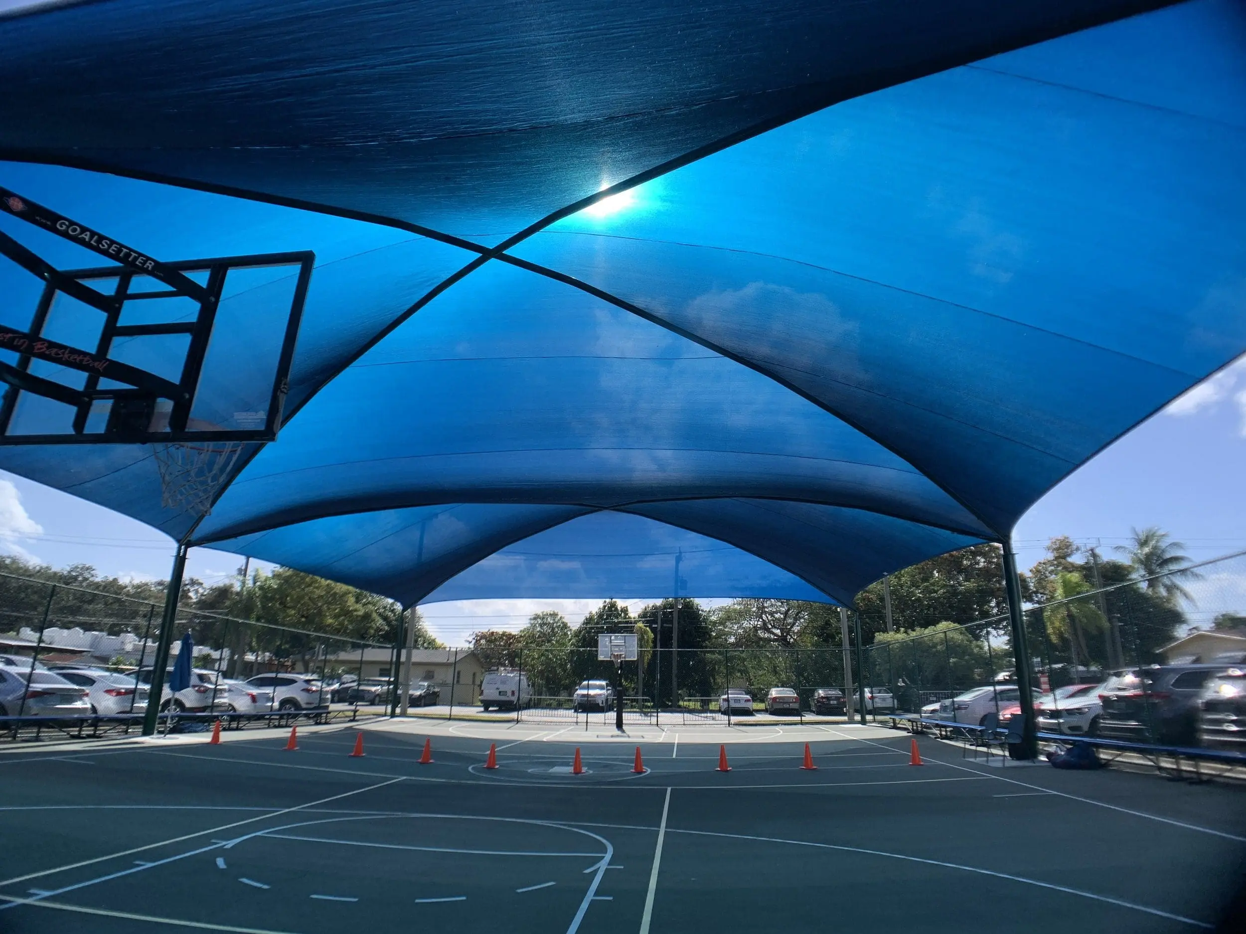 Giant Shade Header over a basketball court