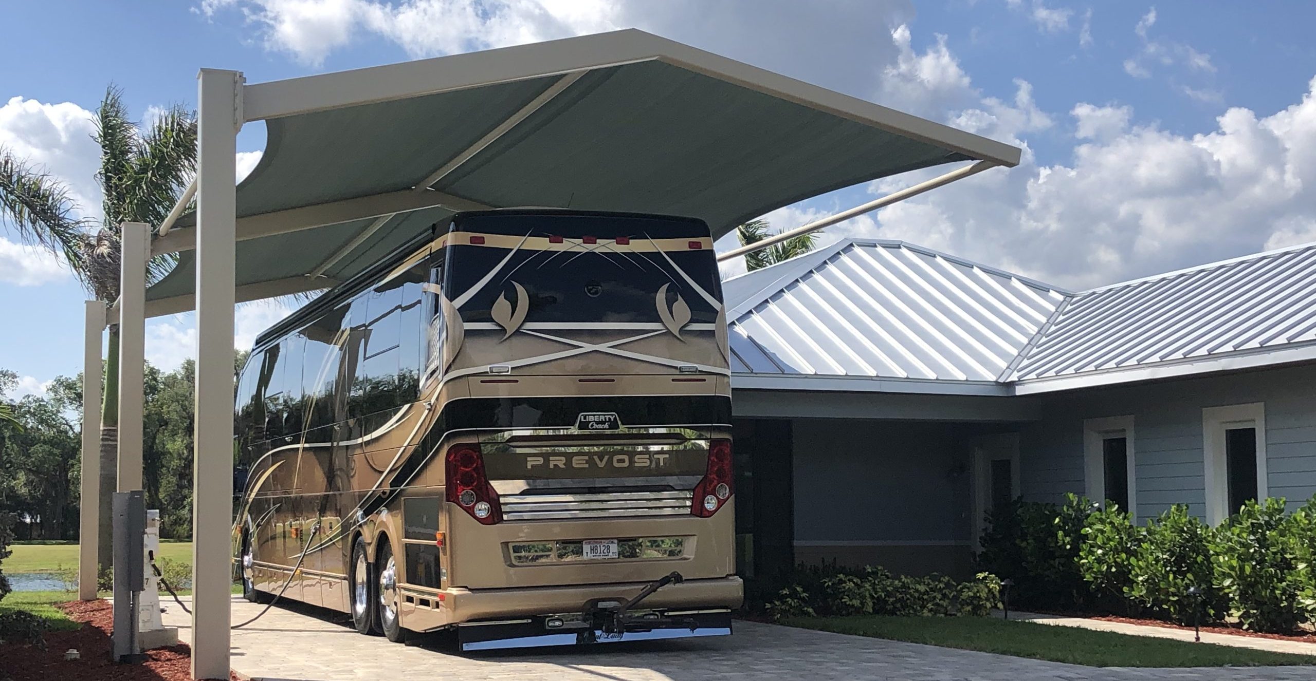 shade cover over house covering a bus